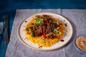 Stir fried Beef with Crispy Egg Noodle Pancake Recipe from Eva Pau's Asian Kitchen